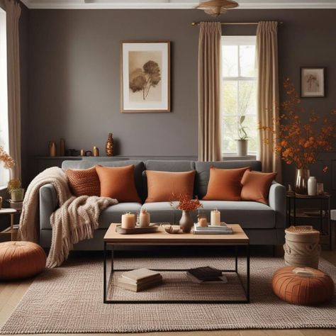 Autumn vibes alert! 🍁✨ Want to create a warm and inviting living room this season? Interior design experts spill the beans on how to infuse your space with autumnal cosiness and character. Here are some tips to turn your living room into a snug sanctuary: 1. Add blankets and throws for a touch of softness and warmth 🛋️ 2. Incorporate scents like cinnamon and eucalyptus to set the mood 🕯️ 3. Dress your fireplace with rustic garlands of dried leaves and pine cones 🔥 4. Layer your lighti... Blue Gray And Rust Living Room, Gray And Rust Living Room, Grey And Rust Living Room Decor, Grey And Terracotta Living Room, Warm Tone Living Room, Terra Cotta Living Room, Cinnamon Living Room, Terracotta Living Room, Inviting Living Room