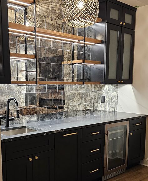 We love a well-designed wet bar that blends practicality and style! Whether you’re entertaining guests or relaxing with family, this mini bar adds convenience and elevates your space. A perfect addition to any basement renovation!  #HomeRenovation #BasementDesign #WetBar #InteriorDesign #BasementRenovation #HomeBar #EntertainingAtHome #CustomHomeDesign #LuxuryLiving #HomeInspiration #DIYHome #ModernHome #HomeImprovement #InteriorStyling #HomeGoals Basement Bar Modern, Wet Bar Backsplash Ideas, Black Wet Bar, Small Wet Bar Ideas, Bar In Basement, Wet Bar Backsplash, Small Wet Bar, Modern Basement Bar, Wet Bar Basement