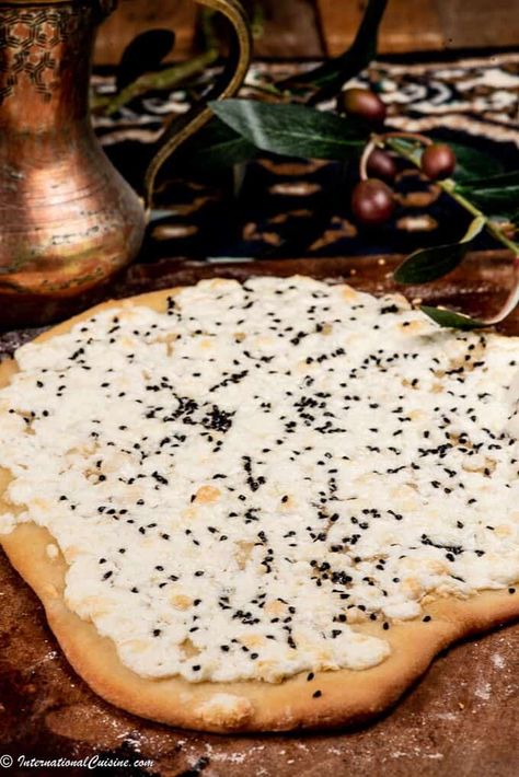 A delicious flat cheese bread called Akkawi manakeesh, super popular in Saudi Arabia, and for good reason, it is delicious! #akkawimanakeesh #cheesebread #saudiarabiancuisine #saudiarabianfood #saudiarabia Saudi Arabian Recipes, Arabian Recipes, Arabian Food, Grilling Gifts, Pizza Stone, Cheese Bread, Middle Eastern Recipes, Arabic Food, Authentic Recipes