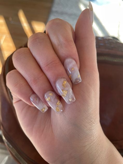 Grad Nail Ideas Almond, Gold Speck Nails, Clear Acrylic Nails With Gold Flakes, French Tip And Marble Nails, Marble Nails Gold Flakes, White Nails With Gold Design, Marble Nails With Gold Flakes, Nails With Foil Flakes, Eid Nails