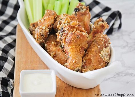 Baked Garlic Parmesan Chicken Wings in a bowl with celery and a small bowl of ranch dressing are a perfect super bowl appetizer #vegetables #fruit #cheese #food Super Bowl Food Recipes, Baked Garlic Parmesan Chicken Wings, Baked Garlic Parmesan Chicken, Garlic Wings, Parmesan Chicken Wings, Garlic Parmesan Chicken Wings, Hot Cheese, Cheesecake Dip, Cheese Chicken