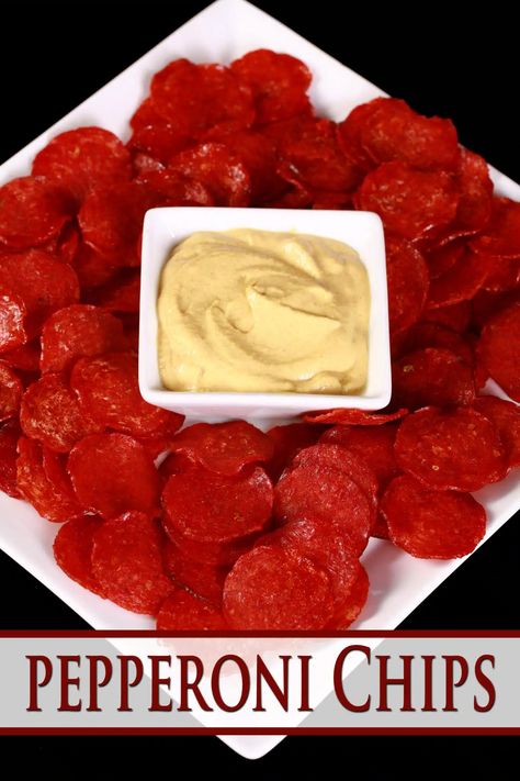 A plate of baked pepperoni slices surrounding a bowl of mustard. Overlaid text says pepperoni chips. Fried Pepperoni, Pepperoni Appetizers, Baked Pepperoni, High Protein Keto, Pepperoni Chips, Pepperoni Recipes, Crispy Chips, Keto Cookie Recipes, Keto Snack