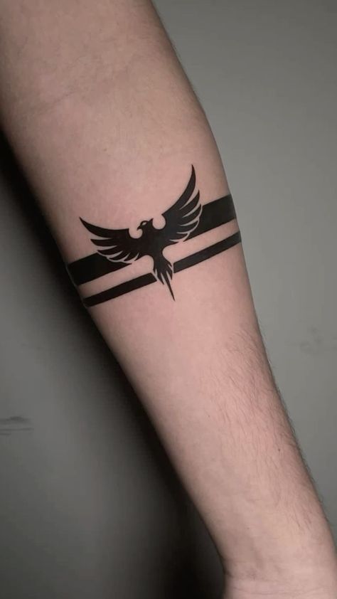 Eagle Band Tattoo, Phoenix Tattoo Men, Black Band Tattoo, Falcon Tattoo, Fenix Tattoo, Rising Phoenix Tattoo, Wrist Band Tattoo, Simple Hand Tattoos, Band Tattoos For Men