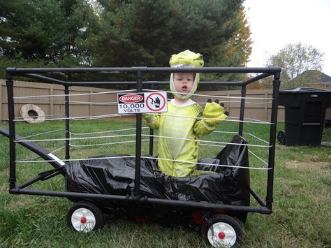 jurassic park halloween, DIY dinosaur, electric fence wagon, family costume, toddler, boys Jurassic Park Wagon, Halloween Wagon, Jurassic Park Halloween, Wagon Costume, Jurassic Park Costume, Family Costumes For 3, Disney Family Costumes, Family Costumes Diy, Wagon Ideas