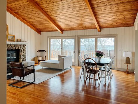 Main living area of cabin painted Benjamin Moore Swiss Coffee and Farrow & Ball Shaded White trim. Farrow Ball Shaded White, Cabin Wall Colors, Knotty Pine Living Room, Painted Pine Walls, Cabin Update, Benjamin Moore Swiss Coffee, Cabin Paint Colors, Knotty Pine Walls, Log Home Interior