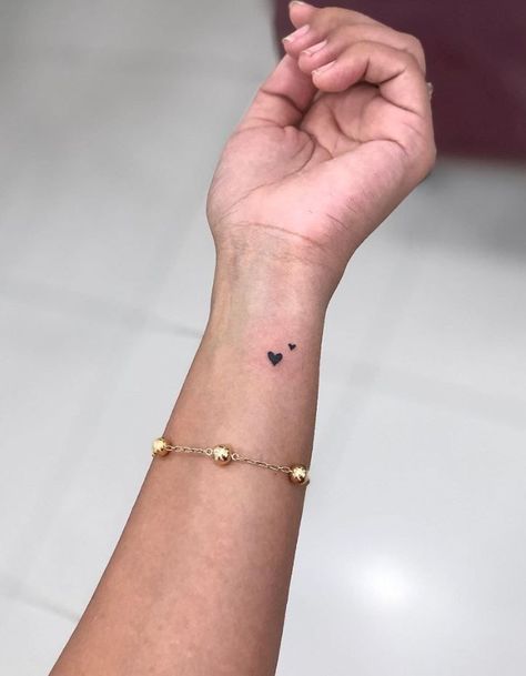 Mini Black Heart Tattoo, Micro Hearts Tattoo, Love Heart Wrist Tattoo, Two Hearts One Love Tattoo, Two Tiny Hearts Tattoo, Tiny Tattoo For Son, Self Love Hand Tattoo, Cute Heart Tattoo Designs, Small Heart Wrist Tattoos For Women