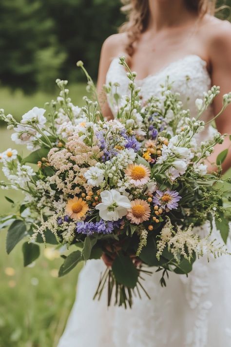 Discover 31 amazing wildflower bouquets for summer weddings! Unique and beautiful, these designs will make your big day unforgettable. View them now! #amazingbouquets #wildflowersummer #bridalbeauty Moss Bouquet, Wildflower Bouquets, Wildflower Wedding Bouquet, Summer Wedding Bouquets, Colorful Bouquet, Wildflower Bouquet, A Match Made In Heaven, Wildflower Wedding, Match Made In Heaven