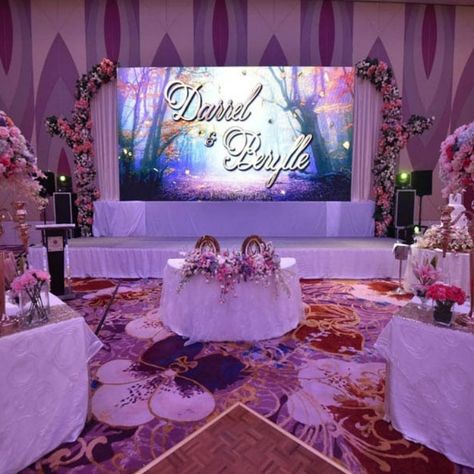 A wedding LED screen is an element that transforms your wedding venue with customizable sizes and different light temperatures to fit your style. They are suitable indoors and outdoors; imagine how wonderful your outdoor ceremony might look if you have your favorite landscape playing on repeat. You may also visit our website for more blogs, links, and articles; https://www.yuchip-led.com/ or email us your concerns at manager@yuchip.com. #WeddingLEDScreen #WeddingLEDDisplay #WeddingLEDPanel Wedding Led Screen Backdrop, Led Screen Stage Design Wedding, Wedding Led Screen, Led Video Wall, Led Screen, Video Wall, Led Panel, Stage Design, Different Light