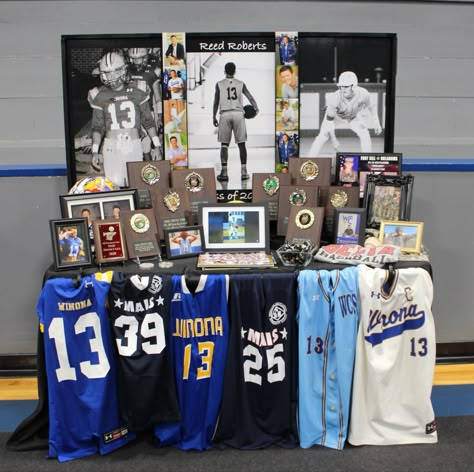 Jersey Display For Grad Party, Senior Brag Table Ideas, Sports Table Grad Party, Jersey Display Ideas Graduation, Letterman Jacket Display Grad Parties, Jersey Display Graduation Party, Graduation Table Display Ideas, How To Display Jerseys At Graduation, Senior Memory Table Ideas