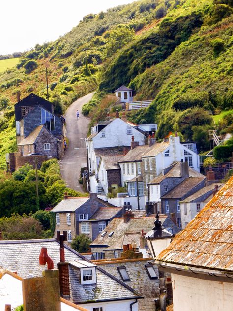 Port Isaac is a small and picturesque fishing village on the Atlantic coast of north Cornwall, England, United Kingdom. The nearest towns are Wadebridge and Camelford, both ten miles away. Port Gaverne, commonly mistaken to be part of Port Isaac, is a nearby hamlet that has its own history. The meaning of the Cornish name is "corn port", indicating a trade in corn from the arable inland district. Port Isaac, Kentish Town, North Cornwall, Doc Martin, Into The West, English Village, Devon And Cornwall, Cornwall England, West Country