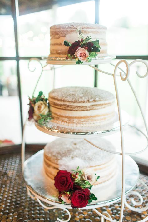 Simple Separated Naked Cake on three tiered stand with beautiful red floral accents | Garden Barn Wedding in Allegan, Michigan | Photos by Arielle Peters Photography Tiered Cakes Diy, Wedding Cakes Stabds, 3 Tier Naked Wedding Cake, Simple Wedding Cake 3 Tier Fresh Flowers, Two Tier Wedding Cake Wildflowers, 3 Tier Wedding Cake Semi Naked, Three Tier Cake Stand, Pear And Almond Cake, Tiered Cake Design