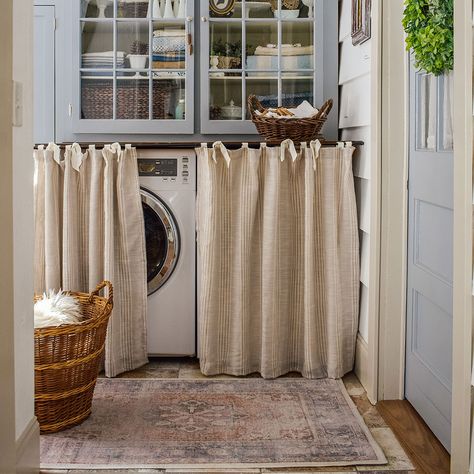 11 Laundry Room Decor Ideas to Spruce Up the Space | Ruggable Blog Cozy Cottage Laundry Room, Laundry Room Vintage Wallpaper, Laundry Room Antique Decor, Whimsical Laundry Room, Cottagecore Laundry Room, Cottagecore Aesthetic Laundry Room, Ruggable Blog, Pretty Laundry Room, French Laundry Room