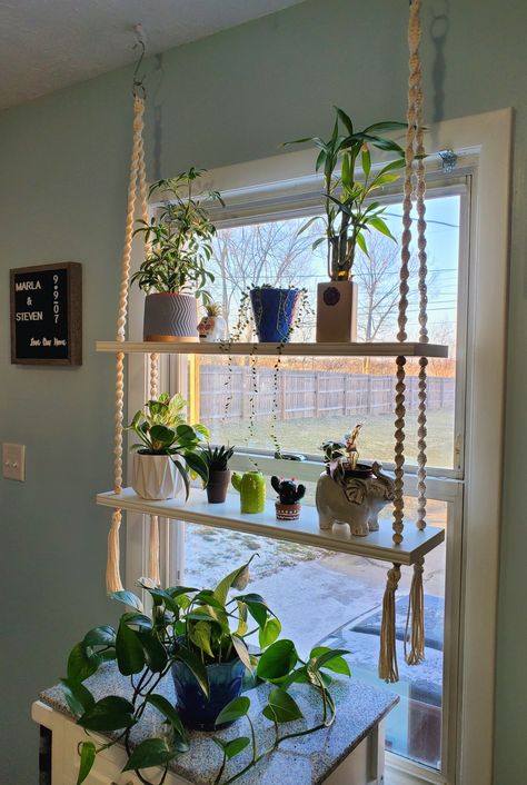 Macrame plant shelves hanger Wood Window Plant Shelf, Macrame Plant Hanger In Window, Window Hanging Shelves For Plants, Hanging Shelf Window, Window Plant Hanger Curtain Rods, Hanging Shelf In Front Of Window, Diy Kitchen Window Shelf, Shelf In Window For Plants, Macrame Window Shelf