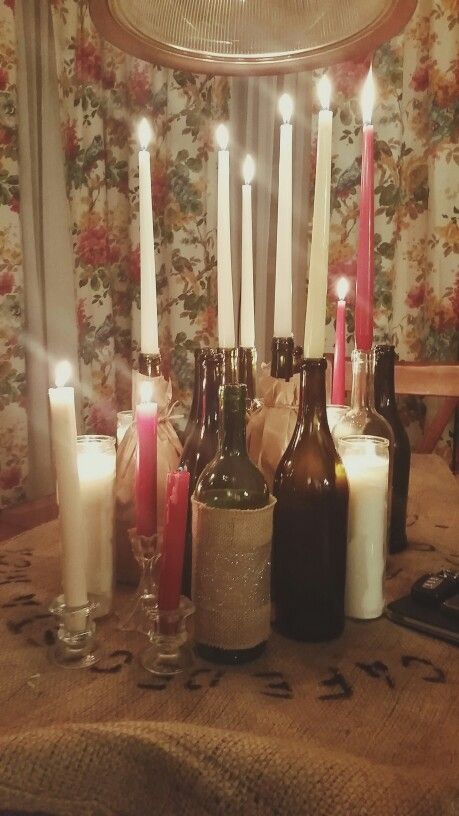 Wine Bottle With Candle Stick, Candlestick Wine Bottle, Wine Bottle Taper Candle Holders, Candles In Glass Bottles, Candles In Wine Bottles Aesthetic, Candle In Wine Bottle, Candles In Wine Bottles, Wine Bottle Candle Holders, Wine Bottle Candle Centerpiece