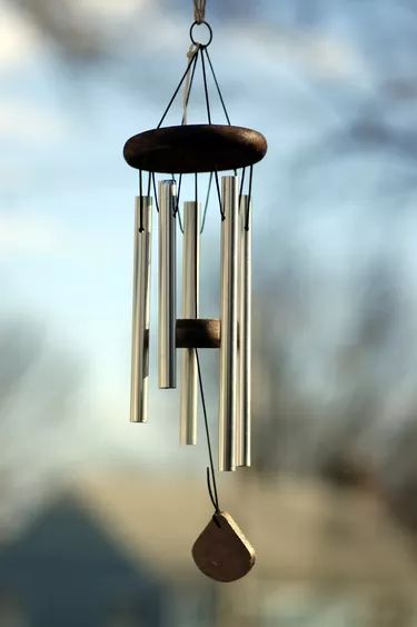 How to Restring Outdoor Wind Chimes | eHow Outdoor Wind Chimes, Best Gas Grills, Make Wind Chimes, Wind Chimes Homemade, Wind Chimes Craft, Sensory Garden, Diy Wind Chimes, Natural Background, Wall Mounted Tv