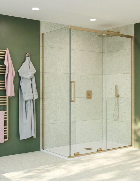 Create a luxury bathroom look with our OPTIX 10 shower enclosure in Brushed Brass. #brushedbrass #brushedbrassshower #greenbathroomideas #modernbathroomideas Steel Shower Door, Pivot Shower Door, Quadrant Shower Enclosures, Quadrant Shower, Pivot Doors, Sliding Shower Door, Outdoor Tiles, Stainless Steel Doors, Shower Tray