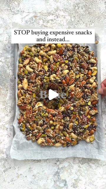 Nutrition_nerd on Instagram: "NUT AND SEED BARK This recipe is a perfect way to increase your nut and seed intake into your diet.  You just need any nuts or seeds of you choice, a little maple syrup and a few minutes to prepare them.  INGREDIENTS 3 1/2 cups of mixed nuts • 1/4 cup pumpkin seeds 1/4 cup sesame seeds 1/4 cup sesame seeds • 1/4 cup maple syrup Chocolate chips (optional)  METHOD Preheat oven to 160c • In a large bowl mix all the ingredients together Pour into a prepared baking sheet Press the mixture firmly down using the back of a spoon. • Bake for 20 minute • Let it cool completely before slicing (mixture will fall apart if sliced too soon)  #nuts #seeds #healthysnacks #recipe #vegan #quickrecipes #snacks #snackideas #healthyrecipes" Mix Nuts Recipes, Nut Mix Snacks, Nut And Seed Crackers, Nut And Seed Clusters, Best Nuts For Protein, Protein Nuts And Seeds, Costco Nut And Seed Brittle Recipe, Granola With Nuts And Seeds, Nut And Seed Granola