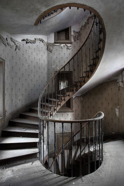 Snake stairs by Bousure, via Flickr I love abandoned places. This is so spectacularly beautiful. Abandoned Stairs, Stunning Staircases, Abandoned Farmhouse, Abandoned Cities, Houses In France, Photo Letters, Old Mansions, Abandoned House, Abandoned Mansions