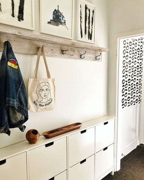 This Canadian Couple’s Toronto Home Is Filled With Vibrant Art and Old Records Narrow Hall Mudroom, Ikea Shoe Storage Mudroom, Ikea Shoe And Coat Storage Hack, Large Family Drop Zone, Ikea Hallway Storage, Small Corridor Ideas, Awkward Entryway Ideas, Vstupná Hala, Interior Design Living Room Modern