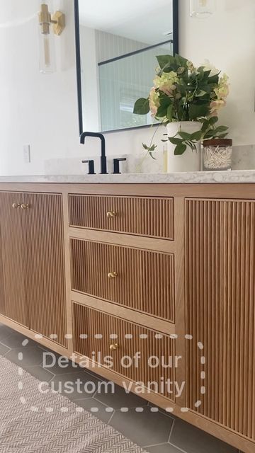 Home by Hamilton on Instagram: "Come check what my husband built! This is very much my favorite part of our remodel so far, and this vanity was part of the vision from day 1. It took a lot to figure out the reeded fronts but he made it happen! Vanity: @clayham.1221 Knobs: @gold_tealandgreen Brass legs: etsy - craft supply 101 Vanity finish: @rubiomonocoatusa Natural Towel hangers: @keyaiira Vanity top: local Fixtures: @deltafaucet Inspired by: @leclairdecor and @eyeforpretty" Painted Reeded Cabinets, Reeded Vanity, Teak Bathroom Vanity, Beautiful Bathroom Designs, Wood Bathroom Vanity, Small Bathroom Vanities, Wardrobe Design Bedroom, Custom Vanity, Kitchen And Bath Design