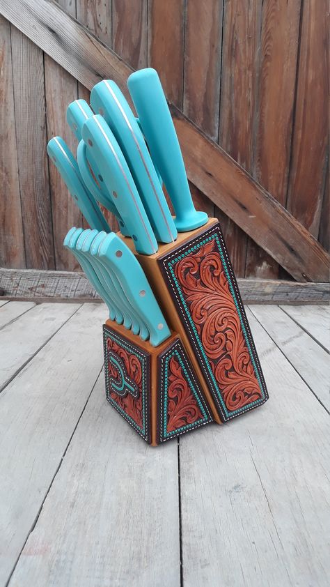 A custom leather tooled knife block designed and made by me! Guaranteed to add a touch of class to any western themed kitchen. This is a fully custom build and there are just to many options to list. After purchase please message me to discuss your design ideas😁 Sets are made with an Oster knife set and block. Although if you would like to change it to something different that can be arranged! Made with 100% real leather. No fake stuff here! Custom Knife Block, Tooled Leather Knife Sheath, Western Kitchen Ideas, Western Knife, Western Interior Design, Western Kitchen Decor, Lane Frost, Western Interior, Western Bedroom Decor