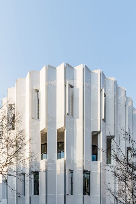 Pleated shutters enclose cylindrical enamelware museum and cultural centre by Wutopia Lab Perforated Metal Panel, Chinese Courtyard, Vertical City, Ancient Chinese Architecture, Metal Facade, Front Yard Design, Cultural Centre, Perforated Metal, Chinese Architecture