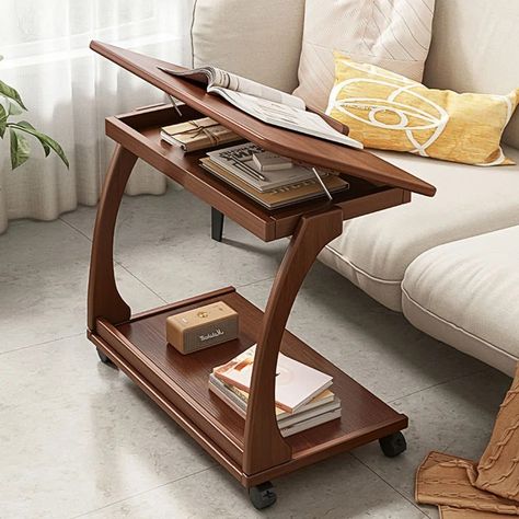 Sitting Room With Tall Table, Cozy Mountain Furniture, Table For Narrow Space, Smaller End Tables, Train Table To Coffee Table, Storage Room Table, Pottery Barn Outlet Furniture, Two Different End Tables, U Shaped Book Shelves