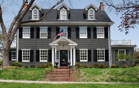 These colors! Dark gray siding, black roof and shutters, white trim Black House White Shutters, Navy Colonial House Exterior, Black Colonial House Exterior, Blue Green Exterior House Colors, Dark Gray House Exterior, White House Exterior Colors, Dark Gray House, House Exterior Colors Blue, Beige House Exterior