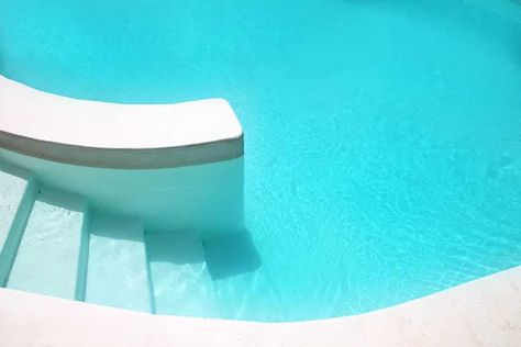 White plaster swimming pool White Pool Plaster, White Plaster Pool Finish, White Plaster Pool, Plaster Pool, Cement Pools, White Pool, Pool Plaster, Exposed Aggregate, Pool Finishes