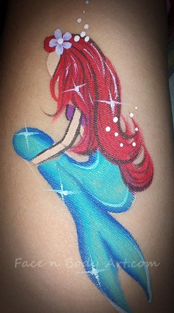 the little mermaid face painter | Flickr : partage de photos ! Face Painting Mermaid, Disney Face Painting, Mermaid Face Paint, Painting Mermaid, Mermaid Face, Cheek Art, Girl Face Painting, Face Painting Easy, Face Paint Makeup