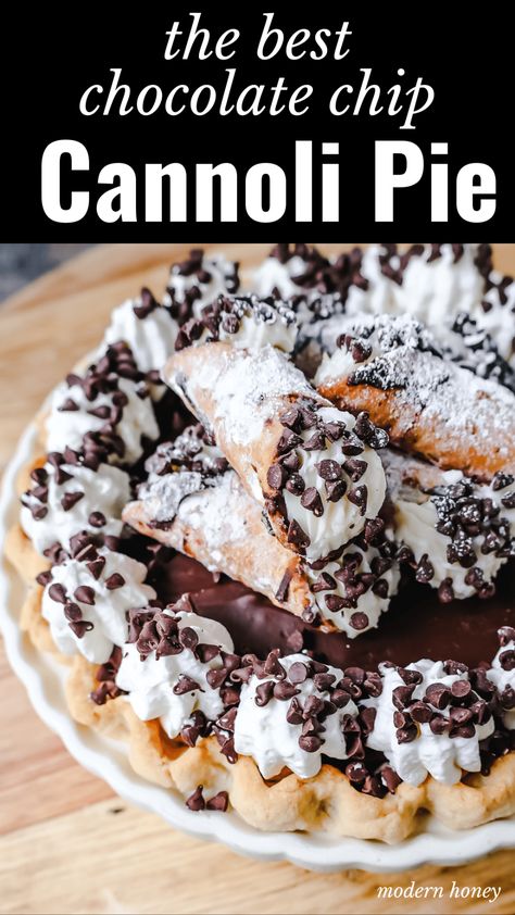 Best Cannoli Pie Recipe The popular Italian dessert -- the famous Cannoli -- but made into a pie. A creamy sweet ricotta and cream cheese filling with mini chocolate chips, topped with chocolate ganache, and freshly whipped cream. Cannoli Pie Recipe, Cannoli Pie, Cannoli Desserts, Sweet Ricotta, Popular Pies, Cannoli Cake, Modern Honey, Cannoli Filling, Cannoli Recipe