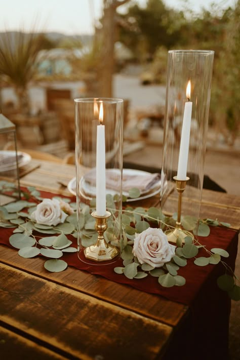 Taper Candles in Hurricane Glass with Linen and Sage for Micro-Wedding for Outdoor Wedding Reception Tall Candles In Glass Vase, Taper Candle With Glass Sleeve, Taper Candles With Glass Sleeves, Tapered Candles In Glass Cylinders, Taper Candle In Glass Cylinder, Candles In Glass Vases, Enclosed Taper Candles Wedding, Candle Sticks In Glass Cylinder, Taper Candles In Glass Cylinders