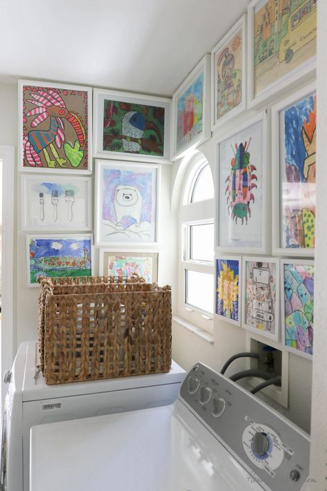 Mudroom Artwork Ideas, Framing Kids Artwork Wall, Laundry Wall Design, Laundry Room Design Colorful, Gallery Wall Ideas White Frames, Colorful Laundry Room Ideas Modern, Kids Artwork Gallery Wall, Laundry Room Eclectic, Eccentric Laundry Room