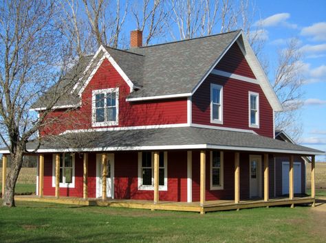 Are you looking for red siding inspiration? Consider LP SmartSide siding and trim. This house features Diamond Kote Cinnabar siding with White trim. House With White Trim, Red House Exterior, Rustic Farmhouse Exterior, Wrap Around Porches, Farmhouse Exterior Colors, Farmhouse Trim, Scary Houses, Red Houses, Farmhouse Exterior Design