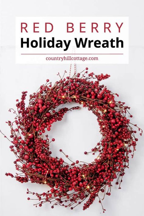 See how to make a DIY red berry wreath! Give guests a beautiful welcome with a large red berry wreath at your front door that spreads holiday spirit! This simple traditional holiday wreath with faux red berries would also be lovely Christmas decor for your fireplace mantle or on a mirror. The easy step-by-step tutorial also includes tips for showcasing and storing the wreath and ideas for variations like a frosted berry wreath and tips for working with real berries. | CountryHillCottage.com Christmas Reef, Holly Berry Wreath, Pip Berry Wreath, Red Berry Wreath, Red Christmas Wreath, Pretty Christmas Decorations, Holiday Wreaths Diy, Rustic Christmas Wreath, Red Wreath