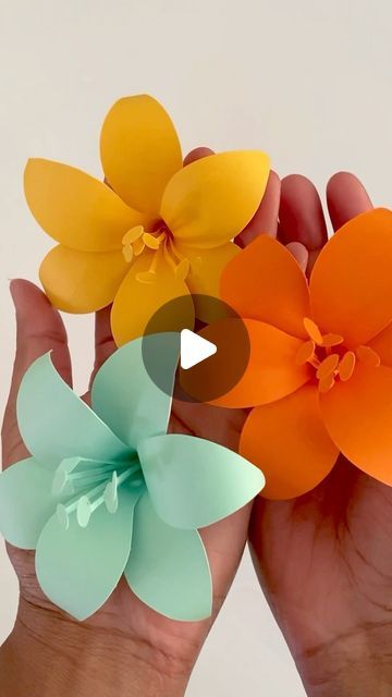 Lebo M on Instagram: "Happy Friday!💛🩵🧡🤗 you can find this template and many more in my Etsy shop. Link in my bio🌸 - - - #paperflowers #tropical #yellow #lilies #paperflorist #orange #papercrafts #etsy #spring #diypaperflowers #colorful #etsyshop #lily #fallflowers #artandcraft #handmade #love #papercrafts #instaflower #beautiful #paperart #sunshine #floresdepapel #cricutmade #fallcrafts #videotutorial #paper #paperartist #flowers #diycrafts" Colour Paper Flower Craft, Diy Hibiscus Flower Paper, Tropical Paper Flowers Diy, Flower Templates Printable Free, Paper Lily, Yellow Lilies, Birthday Party Treats, Flower Bouquet Diy, Paper Flower Crafts