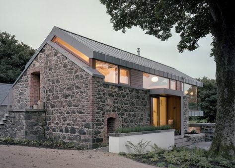 Traditional stone barn updated with a steel-framed living space. Stone Facade, Casas Coloniales, Stone Barns, Exterior Cladding, Barn Conversion, Modern Barn, House Extensions, Stone Houses, Stone House