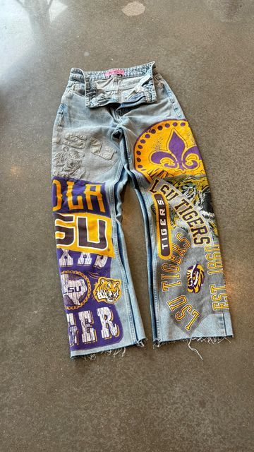 Kenz 🪡 on Instagram: "LSU Denim ✂️" Diy Spirit Jeans, Game Day Diy Outfit, Painted Jeans For Football Games, Lsu Clothes, Cute Gameday Outfits, Lsu Game Day Outfit, Chiefs Jacket, College Jeans, Southern University Jaguars