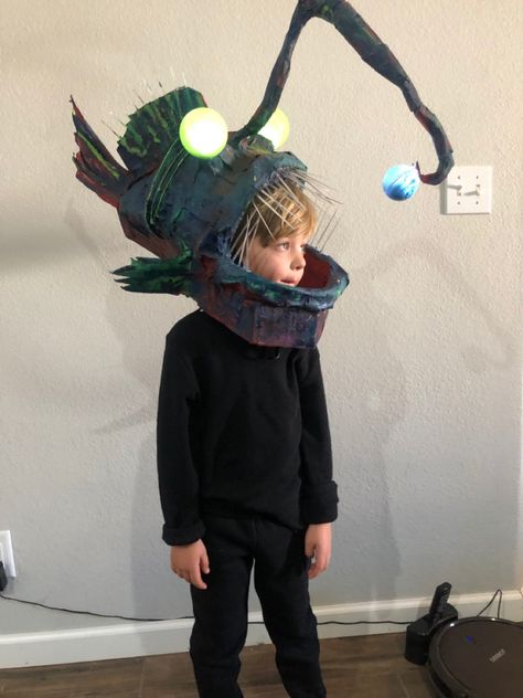 Papier-mâché anglerfish costume Anglerfish Costume Diy, Diy Angler Fish Costume, Angler Fish Costume Diy, Anglerfish Art, Anglerfish Costume, Puffer Fish Costume, Diy Fish Costume, Angler Fish Costume, Fish Costumes