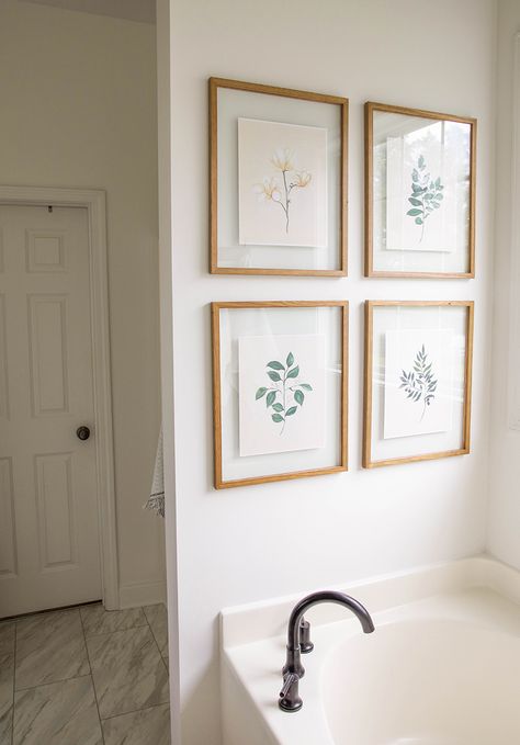 Artwork Above Bathtub, Picture Frame In Bathroom, Art Work For Bathrooms, Bathroom Wall Frame Ideas, Master Bath Wall Art, Bathroom Decor Photos, Artwork Bathroom Ideas, Minimalist Bathroom Wall Decor, Classy Bathroom Art