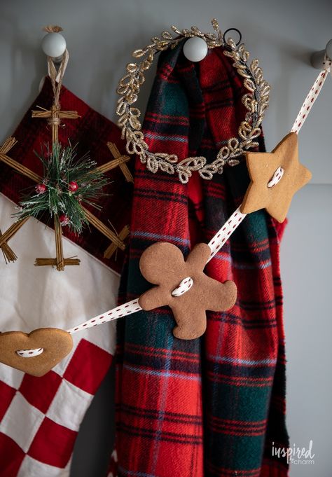 Embrace the joy of a homemade holiday with this Gingerbread Cookie Garland. This step-by-step guide will walk you through creating a picture-perfect Christmas garland out of gingerbread cookies and ribbon that's as fun to make as it is beautiful. Gingerbread Men Garland, Ginger Bread Garland, Gingerbread Salt Dough, How To Make Gingerbread, Homemade Holiday, Salt Dough, Perfect Christmas, Christmas Garland, Gingerbread Man