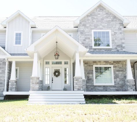 Love the white front door and  Exterior grey stone. The exterior stone is gray with no stain "Ohio Limestone". Porch Gable, Nina Williams, Gray House Exterior, Gray Exterior, Exterior House Colors With Stone, Farmhouse Exterior Design, Gray House, House Facades, Homeward Bound