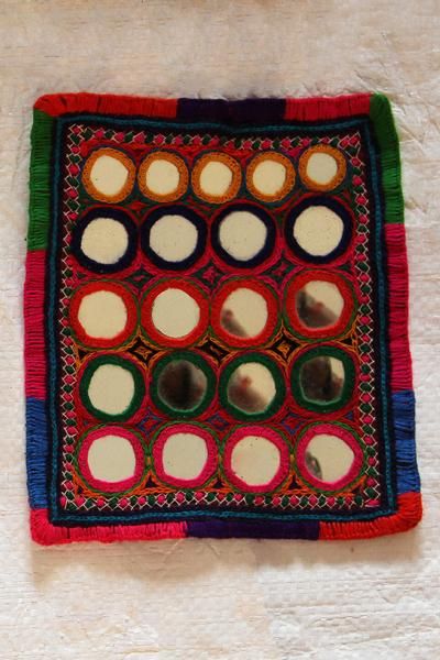 Mirror work embroidered with colorful thread which is worn by the female Lambani’s. Lambani Embroidery, Indian Mirror, Mughal Emperor, Indian States, Navratri Collection, Embroidery Mirror, Kutch Work Designs, Navratri Dress, Buddha Art Painting