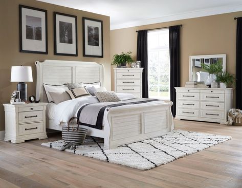 Coastal bedroom in a weathered white finish crafted of poplar solids, poplar veneers, and hardwood solids. Picture frame drawer fronts accented with contrasting bronze hardware. Full extension drawers with ball bearing guides and dovetail joinery. Sleigh bed features louvered panels and bronze accents on headboard and Louvered Panels, White Bedroom Set, Sleigh Bedroom Set, 5 Piece Bedroom Set, Queen Sized Bedroom, Platform Bedroom Sets, Sleigh Bed, Dovetail Joinery, King Bedroom Sets