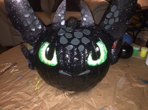 Toothless from How to Train your Dragon made into a decorated pumpkin. My son loved working on it with me Dragon Pumpkin, Decorated Pumpkin, Halloween Pumpkin Crafts, Creative Pumpkin Painting, Creative Pumpkin Decorating, Character Pumpkins, No Carve Pumpkin Decorating, Pumpkin Decorating Contest, Pumpkin Books