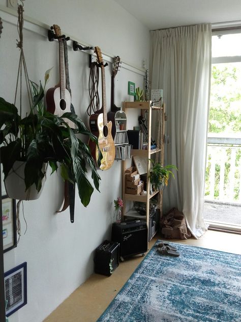 Guitars and plants on a wall  #guitar #plants #home #interior #houseplants #dorm Guitar And Plants Aesthetic, Guitar On Wall Aesthetic, Guitars On Wall Aesthetic, Room With Guitar On Wall, Guitars Hanging On Wall, Guitar On Wall Bedroom, Guitars On Wall Living Room, Hanging Guitars On Wall Ideas, Guitar On Wall