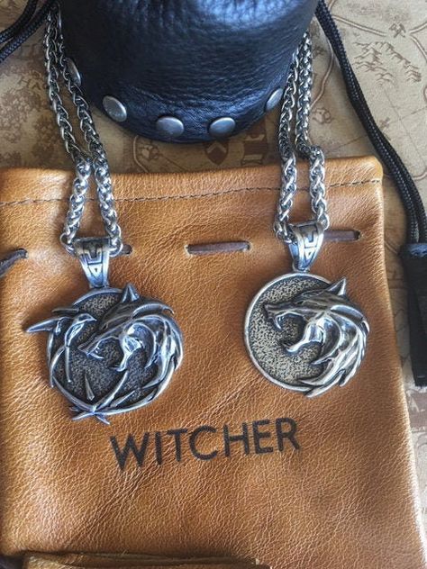 New premium Witcher White Wolf and Trio Medallions with leather pouches by ShopCostumeBiz on Etsy Wolf White, Leather Pouches, The Witcher Geralt, The Witcher Books, Yennefer Of Vengerberg, Wolf Necklace, Womens Costumes, White Wolf, Viking Jewelry