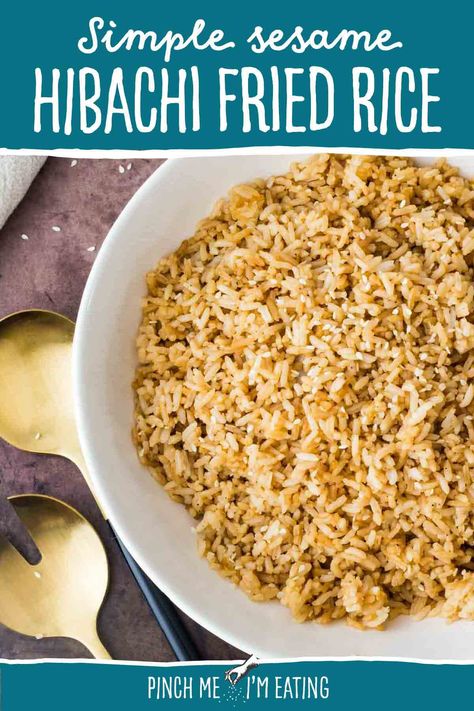 This simple sesame hibachi fried rice will take your tastebuds right back to your favorite Japanese steakhouse! This toasty fried rice is flavored with soy sauce and sesame seeds —no veggies or egg — and takes only 15 minutes to make. It makes the perfect side dish for teriyaki chicken or a full hibachi-style dinner at home! Teriyaki Chicken Side Dishes, Plain Fried Rice Recipe, Plain Fried Rice, Hibachi Fried Rice, Japanese Fried Rice, Hibachi Recipes, Hibachi Chicken, Veggie Fried Rice, Fried Rice With Egg