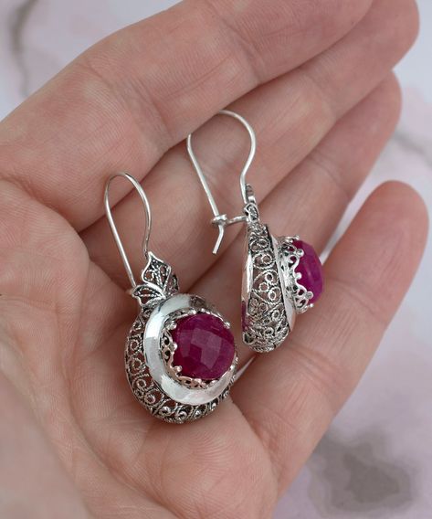 Add a touch of elegance to your ensemble with these handcrafted, filigree art, opaque ruby drop earrings! ✨ Every detail of these sterling silver treasures screams sophistication. Perfect for gifting or treating yourself – they even come in a beautiful gift box! 💝 Ready for that next compliments galore event? Click the link to shop now! 👉 https://nuel.ink/aihcZR #RubyElegance #HandcraftedJewelry #GiftIdeas #SilverSplendor #ShopNow 💎✨ Mehndi Lengha, Ruby Drop Earrings, Simple Silver Earrings, Hand Jewelry Rings, Jewelry Traditional, Treating Yourself, Designer Silver Jewellery, Handmade Jewlery, Bridal Diamond Jewellery