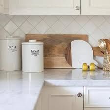 Marble Diamond Pattern Tiles Design Ideas Diamond Tile Backsplash, White Backsplash Tile, Diamond Backsplash, Diamond Tile Pattern, Kitchen Backsplash Tile Designs, Backsplash Design, Backsplash Tile Design, Stainless Steel Backsplash, Island Stools